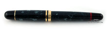 Load image into Gallery viewer, Back view of the fountain pen with the cap on.