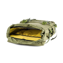 Load image into Gallery viewer, interior view of the green backpack, showing a yellow lining.