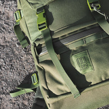 Load image into Gallery viewer, Close up to the olive green backpack.