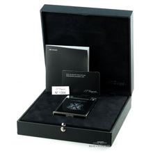 Load image into Gallery viewer, Angled front view of the lighter in its opened presentation box, arranged with the documents and booklet.