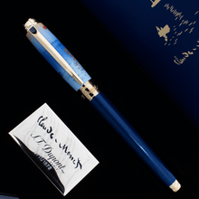Load image into Gallery viewer, Front view of the fountain pen with the cap on in its presentation box.