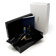 Load image into Gallery viewer, The fountain pen arranged with the documents and packaging.