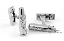 Load image into Gallery viewer, The bullet-shaped cufflinks  arranged on a white background.