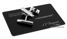 Load image into Gallery viewer, The cufflinks arranged on top of the International warranty card.