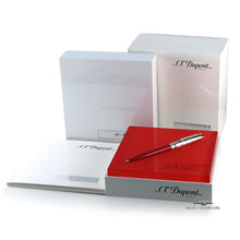 Load image into Gallery viewer, The ballpoint pen with the packaging and booklet arranged on a white background.