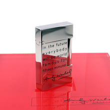 Load image into Gallery viewer, Angled view of the back of the lighter. The quote on it reads: "In the future everybody will be world famous for fifteen minutes" followed by Andy Warhol's signature.