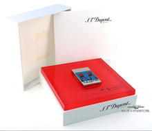 Load image into Gallery viewer, The lighter in its presentation box with the booklet.