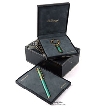 Load image into Gallery viewer, The fountain pen and key chain arranged in their presentation boxes.