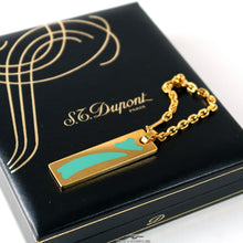 Load image into Gallery viewer, The keychain on top of the presentation box lid.