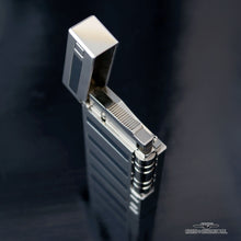 Load image into Gallery viewer, Angled top view of the lighter with the lid lifted.