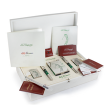 Load image into Gallery viewer, The two pens and three lighters arranged in the presentation case with the certificates and booklets.