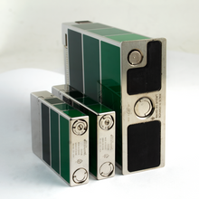 Load image into Gallery viewer, Angled bottom view of the three lighters. They show some slight patina.