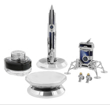 Load image into Gallery viewer, The pen and lighter on their stands with a pair of cufflinks, ink bottle, and ashtray.