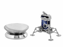 Load image into Gallery viewer, The lighter on its stand next to the ashtray on a white background.