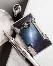 Load image into Gallery viewer, Angled front view of the lighter with the fountain pen and cap next to it.