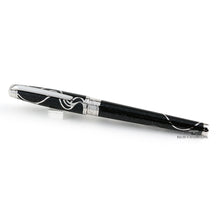 Load image into Gallery viewer, Angled front view of the rollerball pen with the cap on.