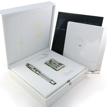 Load image into Gallery viewer, he fountain pen and lighter in their presentation box, arranged with the booklets and certificates on a white background.