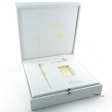 Load image into Gallery viewer, Close up to the interior of the presentation box. The areas where the pen and lighter make contact have yellowed.