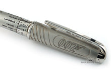 Load image into Gallery viewer, Close up to the top side of the pen with engraved 007 logo.