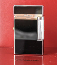 Load image into Gallery viewer, Front panel view of the lighter arranged with the red packaging.