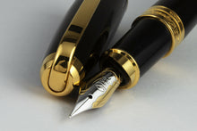 Load image into Gallery viewer, Close up to the fountain pen and cap top.