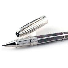 Load image into Gallery viewer, Close up to the grip section of the rollerball pen with the cap next to it.