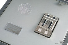 Load image into Gallery viewer, Close up to the lighter in its presentation box slot.