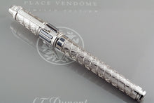 Load image into Gallery viewer, Angled front view of the rollerball pen with the cap on.