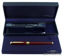 Load image into Gallery viewer, The rollerball pen arranged in the presentation box with the refill and booklets.