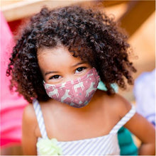 Load image into Gallery viewer, A child with curly hair wearing a pink face mask with a white unicorn pattern.