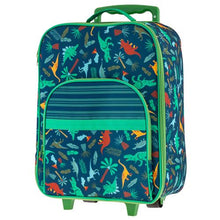 Load image into Gallery viewer, Angled front view of the blue suitcase with green accents. The fabric features dinosaurs and trees.