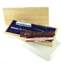 Load image into Gallery viewer, The fountain pen arranged inside its original wooden presentation box with accessories.