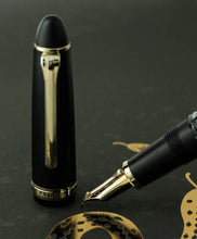 Load image into Gallery viewer, Close up to the cap and fountain pen nib.