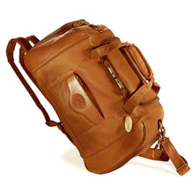 Load image into Gallery viewer, Angled front view of the backpack duffle with the shoulder straps extended.
