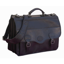 Load image into Gallery viewer, Angled front panel view of the brown leather briefcase with the shoulder strap resting on top.