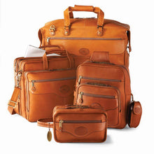 Load image into Gallery viewer, A tan leather duffel, shave kit, briefcase, and sling bag arranged on a white background.
