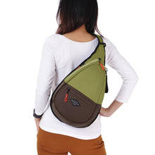 Load image into Gallery viewer, A model carrying the cactus green and brown bag.