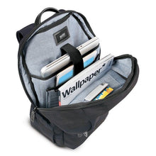 Load image into Gallery viewer, Top view with the main compartment unzipped. a laptop, magazine, and other accessories are tucked in the pockets.