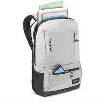 Load image into Gallery viewer, Angled front view of the gray backpack with electronics arranged in the compartments.