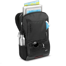 Load image into Gallery viewer, Angled view of the black backpack with the main compartment unzipped. Stationary, accessories and electronics are arranged in the compartments.