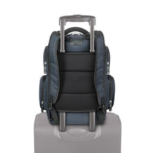 Load image into Gallery viewer, Back view of the backpack with its attachment feature holding it to a suitcase handle.