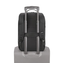 Load image into Gallery viewer, The backpack's horizontal strap attached to the telescopic handle of a suitcase.