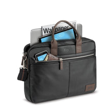 Load image into Gallery viewer, Angled front view with accessories arranged in the pockets.