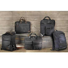 Load image into Gallery viewer, A group shot featuring the complete collection of backpacks and briefcases on a wooden background.