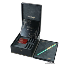Load image into Gallery viewer, The fountain pen arranged with the presentation box, booklet, and ink cartridges box.