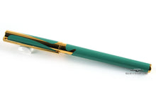 Load image into Gallery viewer, Side view of the fountain pen with the cap on.