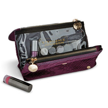 Load image into Gallery viewer, Interior view of the plum bag with cosmetics