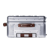 Load image into Gallery viewer, Top panel view of the suitcase. It features a grab handle and the telescopic handle.