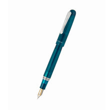 Load image into Gallery viewer, Angled view of the fountain pen in Forest Green, with the cap posted.