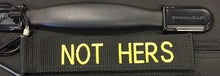 Load image into Gallery viewer, Black luggage tag with yellow embroidered text: NOT HERS